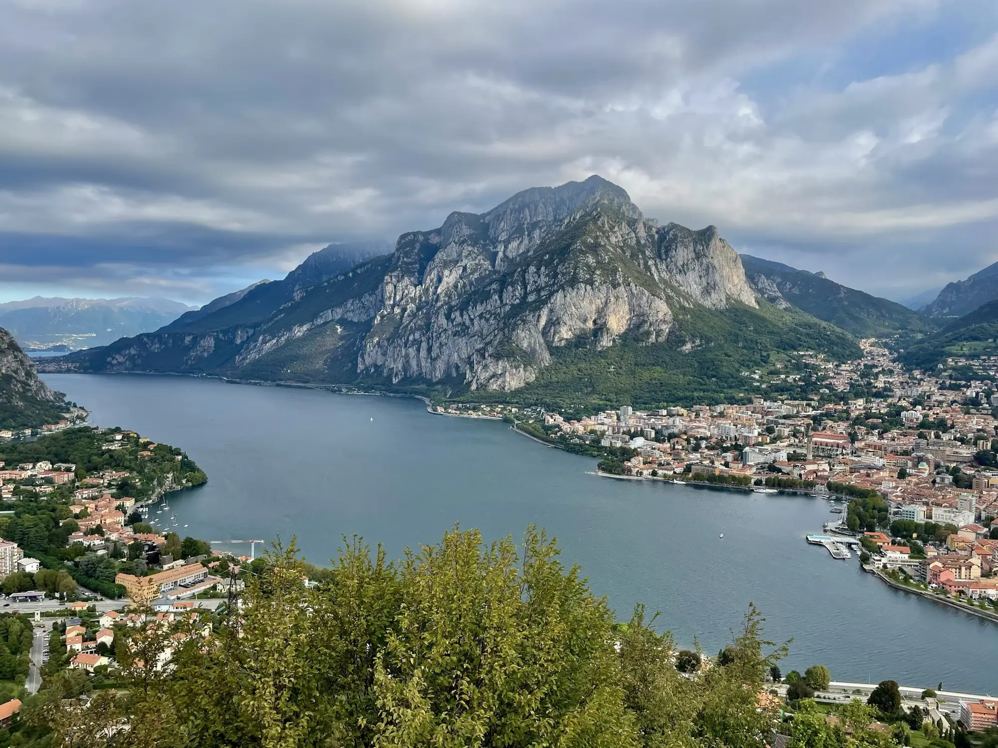 A European lake between mountains, seen from above.